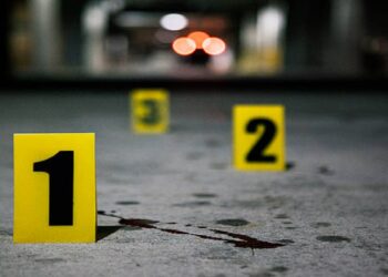 Blood splatter marked at a crime scene.